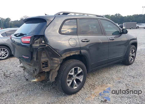 2015 Jeep Cherokee Trailhawk from USA, damaged, VIN 1C4PJMBS2FW583064